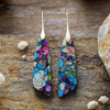 Brincos Pendentes em Silhueta Floral